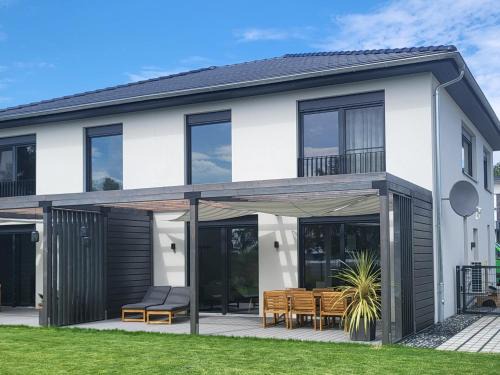 Muldestausee Casa | Ferienhaus Schlossterrassen 8a