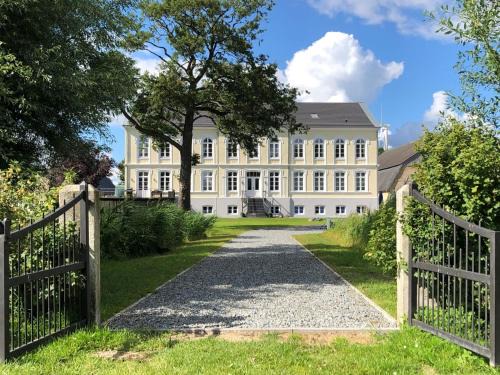 Steinberg Casa | Ferienwohnungen Herrenhaus Gut Oestergaard
