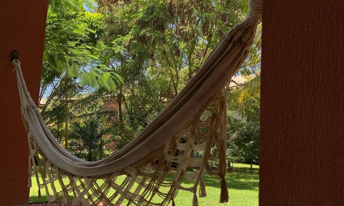 Praia do Forte Apartamento | First floor apartment, garden view, peace and quiet for you in Praia do Forte