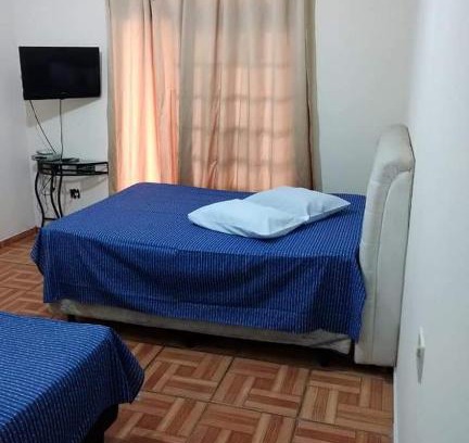 Aparecida Casa | FLAT COM AREA GOURMET para ATÉ 8 PESSOAS