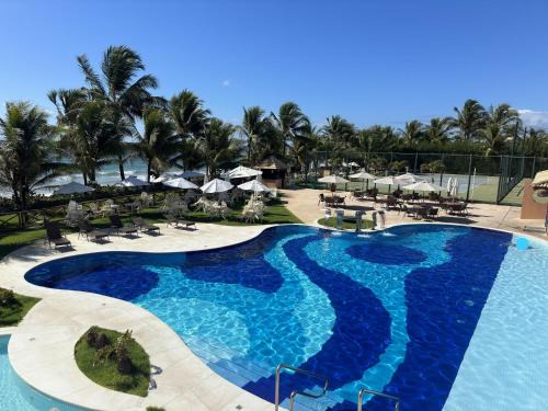 Jenipabu Apartamento | Flat Guarajuba - 3 quartos 2 andar à Beira Mar - pé areia - governança com arrumadeira e Wi Fi inclusos