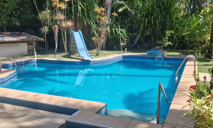 Guaiu Casa | Flower house on the edge of Guaiú beach in a high-standard condominium.