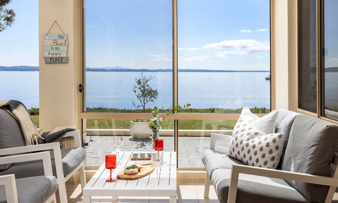 Salamander Bay Casa | Foreshore Delight offers a tranquil holiday retreat with breathtaking water views