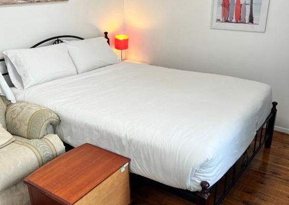 Doonside Casa | Fragrant Homes-68B independent aircon room, with 65’TV, queen size beds, rest sofa, built in wardrobe
