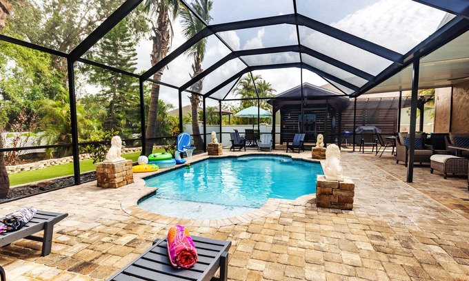 Golf and Sea Village of Apollo Beach Casa | Free heated pool at Apollo Beach gazebo grill pool table games