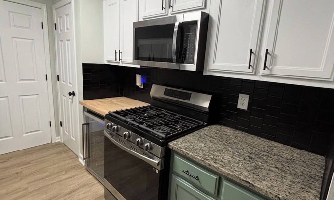 Church Street Casa | Fully Furnished Modern Home Patio with BBQ Grill for Relaxed Outdoor Living