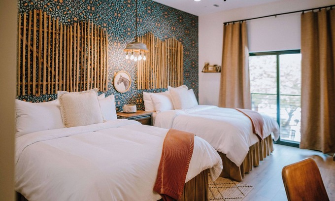 Wimberley Hotel | Gaines Ranch on the Square | The Corral Suite | 2 Queens | Downtown Wimberley