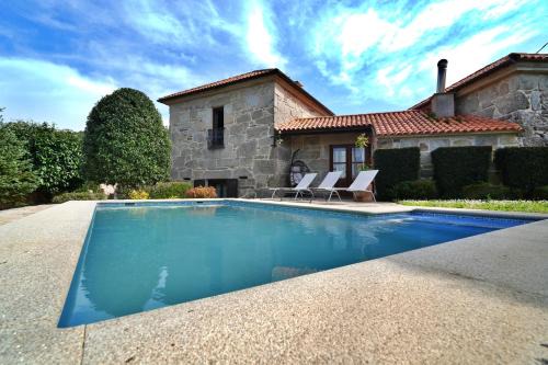 Quintans Casa | GALIHOST - Casa con piscina próxima a Sanxenxo