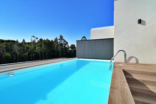 Sanxenxo Apartamento | GALIHOST - Precioso apartamento con piscina en Playa de Silgar