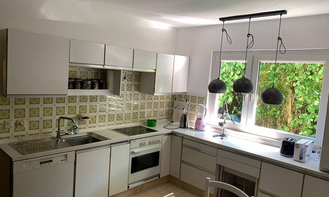 Woergl Apartamento | Gartenparadies Inmitten Wörgl - Ferienhaus, Badewanne, 4 Oder Mehr Schlafräume