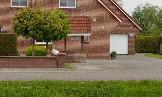 Spetzerfehn Apartamento | Gemütliche Ferienwohnung am Kanal im Herzen Ostfrieslands
