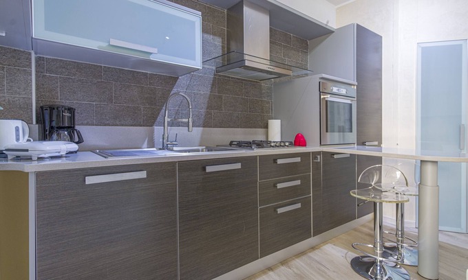 Luino Condominio | Gemütliche Kleine Wohnung mit 30 qm Garten in Luino