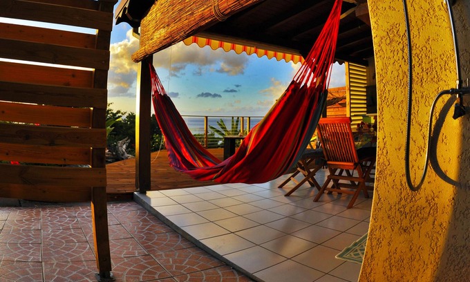 Malendure Cabaña | invernaderos AKANSYEL vista al mar Caribe (verde)