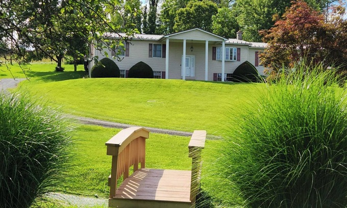 Muncy Casa | Glade Run House - A quiet country home retreat with a stream running through it.