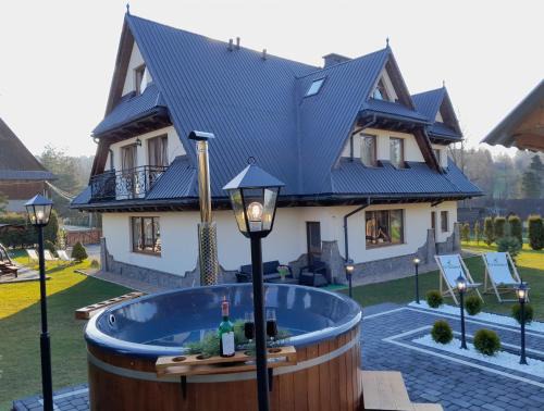 Brzegi Casa | Gościniec Grandel domek z balią
