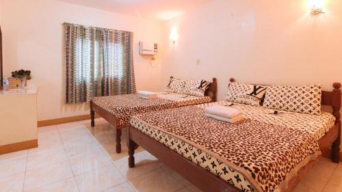 Rosario Hotel | Golden Sunrise Hotel II by RedDoorz