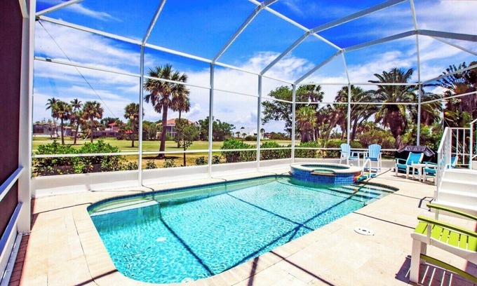 Beachview Country Club Estates Casa | Golf course pool home on 12th hole of the Sanibel Island Golf Club - Isle Awhile