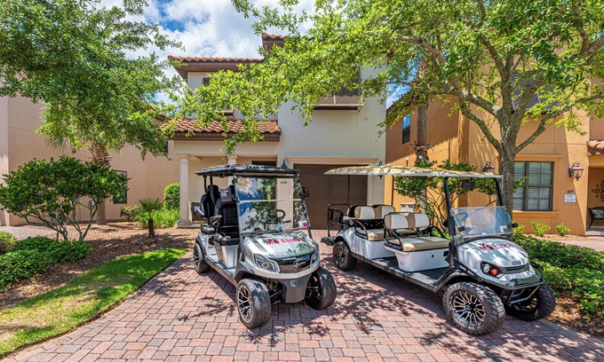 Villa Lago Casa | Golf Course View Beach House with 2 Golf Carts