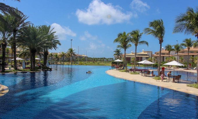 Porto das Dunas Apartamento | Golf Ville High standard apartment 3 suites with gourmet balcony