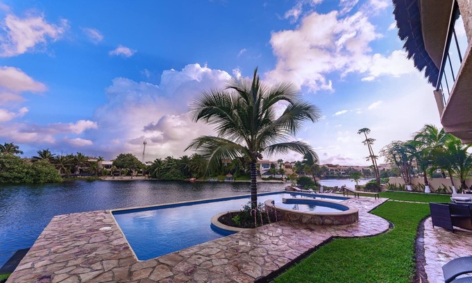 Puerto Aventuras Condominio | SEP -DEC Special, Lagoon Condo, Carrito de golf, Membresía Omni Beach Club, Wi-Fi