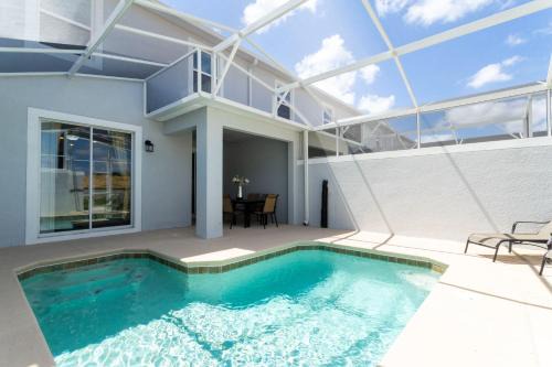 Florida Central Atlantic Coast Casa | Gorgeous 4Bd Close to Disney w/Pool @ Champions Gate Resort 1196