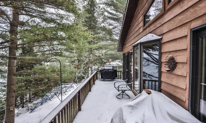 Lake Tomahawk Casa | Gorgeous 5 bedroom home on Two Sisters Lake with direct snowmobile access!