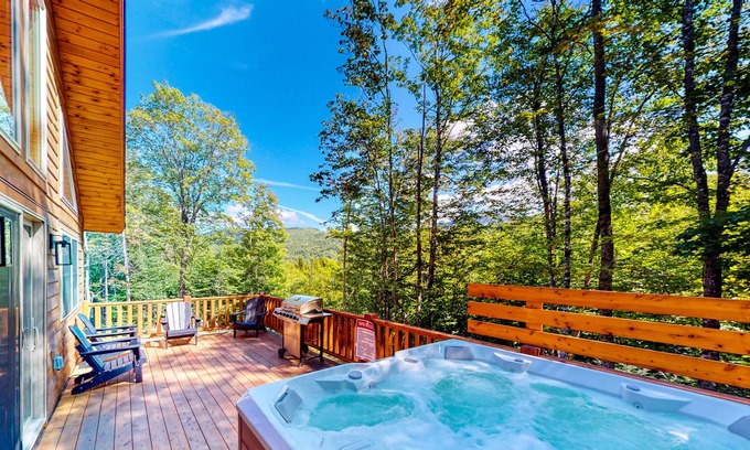 Carrabassett Valley Cabina | Gorgeous dog-friendly cabin with great view, deck, hot tub, & gas fireplace