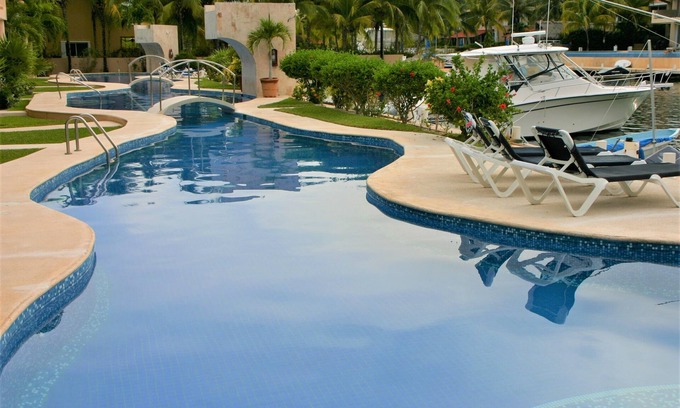 Puerto Aventuras Condominio | Planta baja 3 habitaciones, 3. 5 baños Marina Condo w / OMNI Beach Club Membresía y WIFI