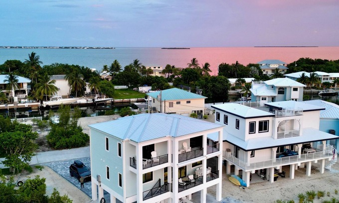 Cudjoe Gardens Casa | Gorgeous new build on Cudjoe Marina Basin with 80 ft boat dock and private pool