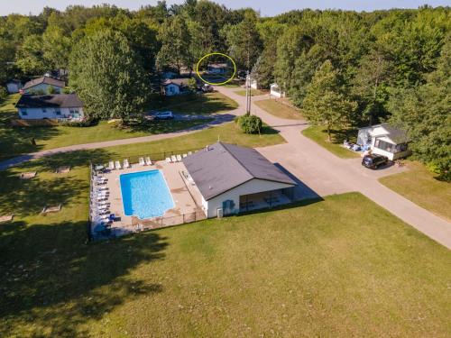 Saugatuck Casa | Goshorn 18 - Located in Goshorn Lake Resort - Shared pool - Lake access