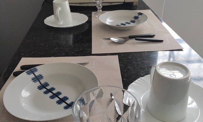 Centro Casa | Gray house in the city center, close to hospitals