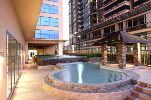 Ermita Apartamento | Grand reviera in the front of famous sunset of manila with stunning beauty of dolomite sand