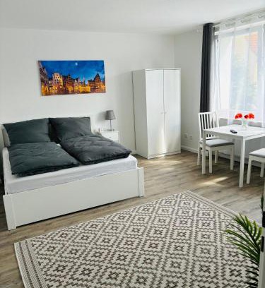 Stadtmitte/Neustadt Apartamento | Grothes City Apartment am Rathaus