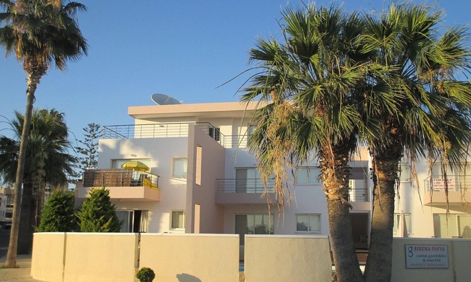 Paphos Apartamento | Apartamento en planta baja con piscina, aire acondicionado, TV, DVD, WIFI, patio y estacionamiento privado