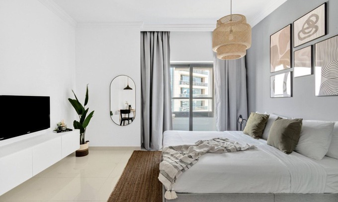 Business Bay Apartamento | GuestReady - Modern living at Capital Bay