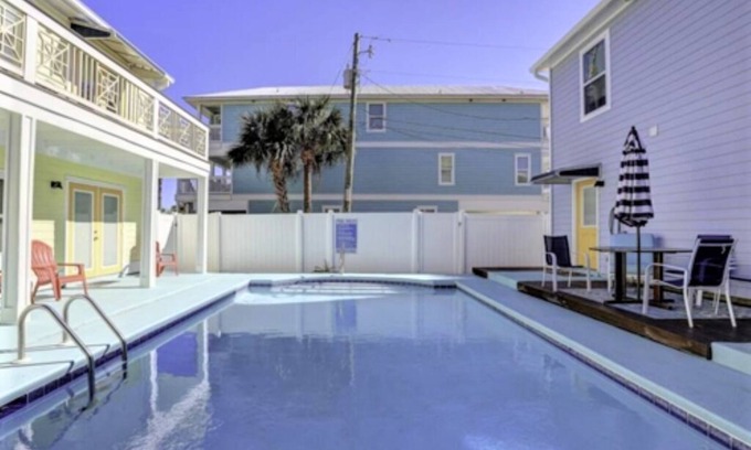 Panama City Beach Villa | Gulf View Condo with Pool & Grills. Minute walk to Beach. Pet-Friendly!