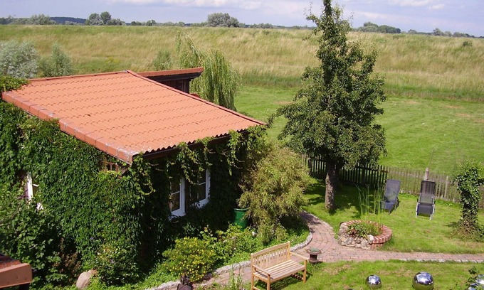 Damnatz Casa | De entramado de madera - casa de vacaciones a ras del suelo y sin barreras tranquilas. En el Elbdeich Damnatz