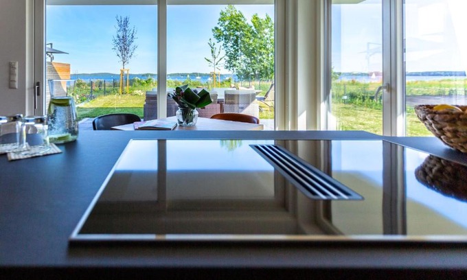 Schwerin Apartamento | Hangar 19 Luxusbungalow am See mit Kamin 3
