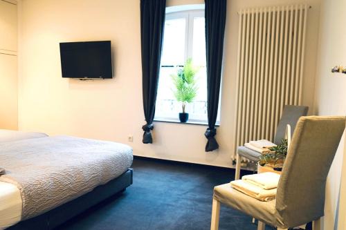 Stadtmitte Apartamento | Haus im Grünen für 6 Personen-3 Schlafzimmer- 3 Bädern -Waschmaschine-große Terrasse- vollausgestattete Küche