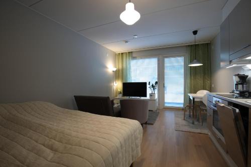 Tapiola Apartamento | Hieno yksiö Tapiolan urheilupuistossa.