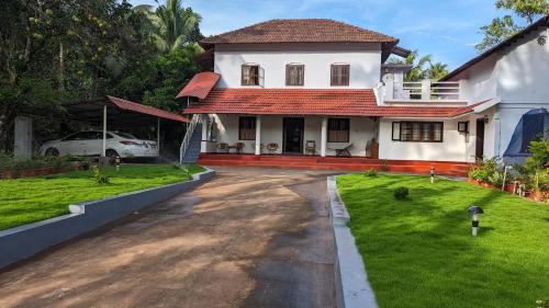 Kannur Cama Y Desayuno | HILL TOP HOMES
