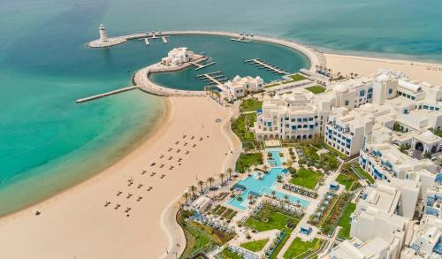 Abu Samra Complejo | Hilton Salwa Beach Resort and Villas