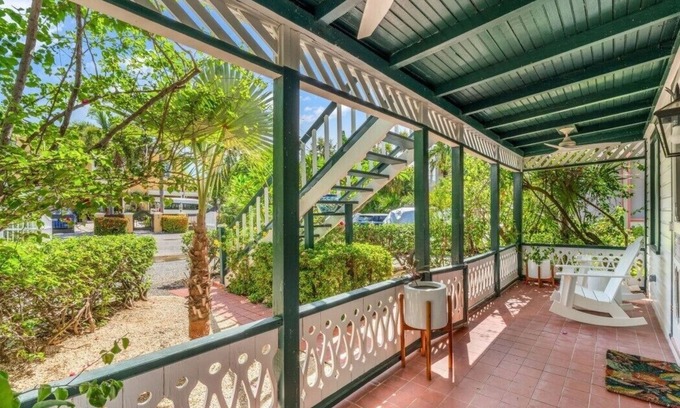 West Bay Cabaña | Historic Boggy Sand Wood Cottage with Pool & Private Seven Mile Beach Access