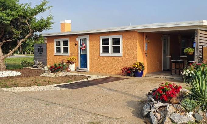 Colington Cabaña | Historic Cottage Steps from the Beach and Dog Friendly!