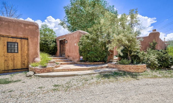 Taos Casa | Historic dog-friendly hacienda with 2 casitas, fireplaces, on-site hot tub, yoga
