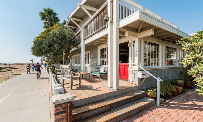 Balboa Peninsula Casa | Historic house with beach vibe. Sand out the front door, ocean on the horizon