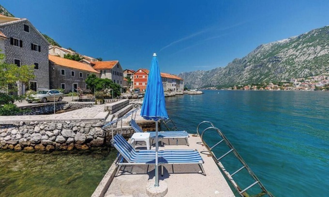 Kotor Casa | Historic waterfront house near Kotor with a private swimming pier