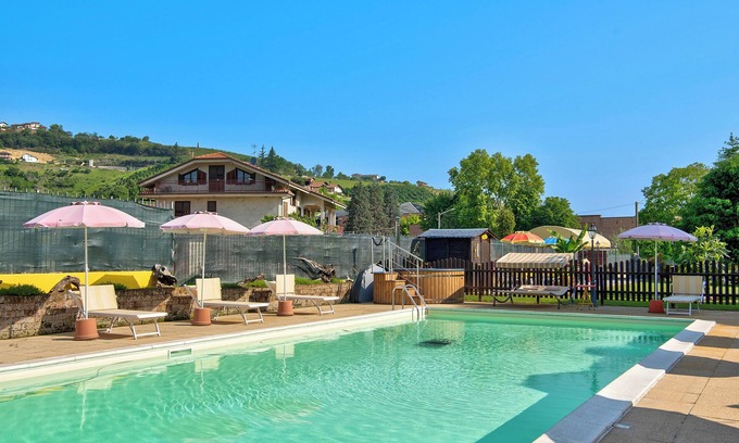 San Matteo Apartamento | Apartamento de vacaciones 'Magnolia' en Piamonte, con piscina compartida, jardín y sauna