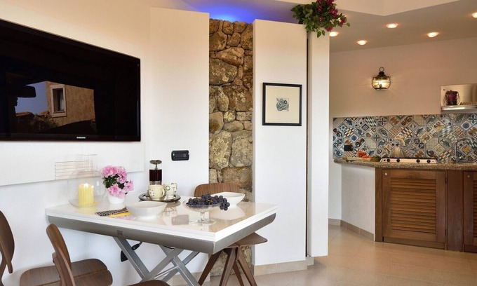 Porto San Paolo Apartamento | Holiday apartments L'Ea di Lavru SEA VIEW 2-rooms apartment-TOP INTERIOR DESIGN