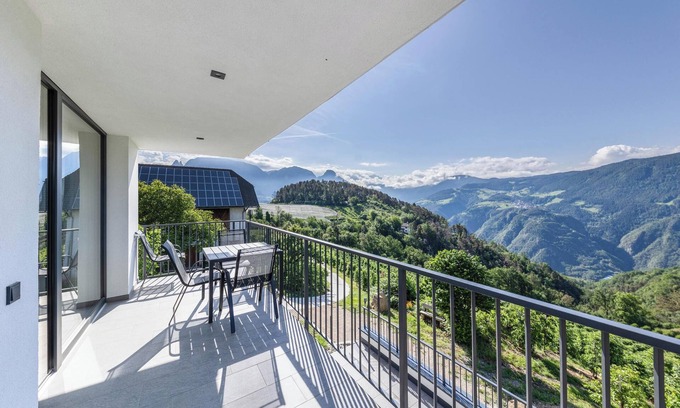 Renon Apartamento | Apartamento vacacional "Thalerhof Naturae Montes Ritten" con vistas a la montaña, terraza y Wi-Fi